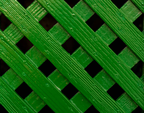 istock Green Criss-Cross Lattice Background 1020044660
