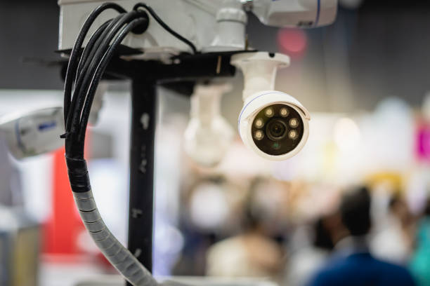 istock Closed-circuit television, Security CCTV camera or surveillance system in office building shopping mall, Safety of private property and modern technology concepts. 1020044794