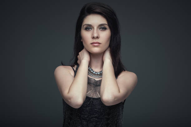 istock Portrait brunette attractive woman, accent on arms 1020046084