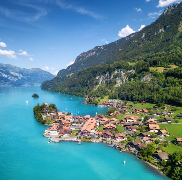 Aerial view on the town and Interlaken lake. Natural landscape from drone. Aerial landscape from air in the Switzerland stock photo