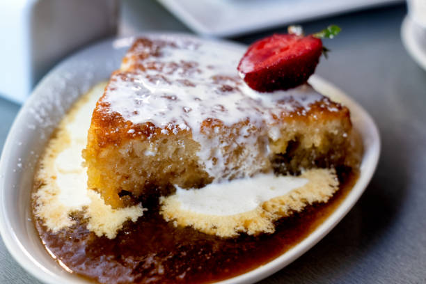 Traditional dessert in the Provincial Quebec, Maple Pudding Cake with heavy cream and maple sauce drizzled on it