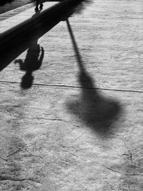 istock Child and streetlight shadows. 1020054058