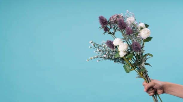 istock wild and beautiful flower bouquet on light background. 1020060838
