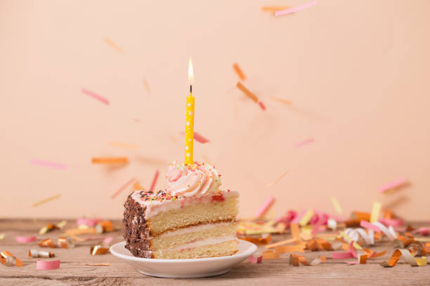 istock piece of cake on a wooden table 1020063272