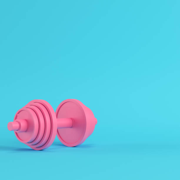 istock Abstract pink dumbbell on bright blue background in pastel colors 1020064654