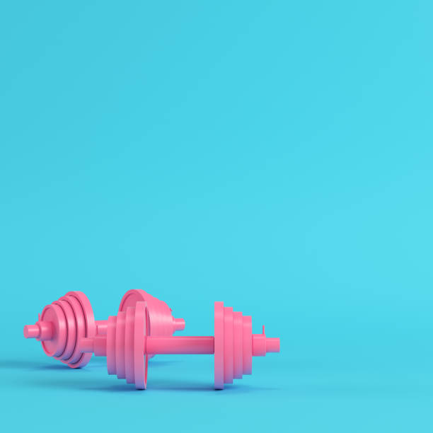 istock Abstract pink dumbbells bright blue background in pastel colors 1020064728