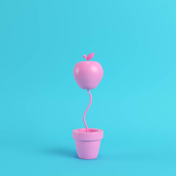 istock Pink apple in the pot on bright blue background in pastel colors 1020066892