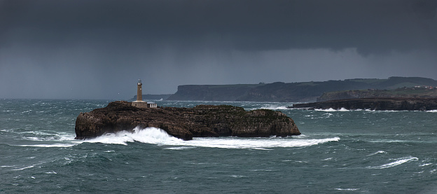 LIGHTHOUSE AND A HUGE STORM WITH WAVES