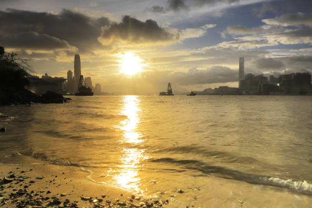 istock a Sunset skyline over HK business downtown skyline 1020071170