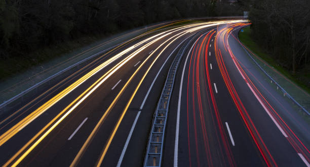 istock Car lights in the highway 1020079104