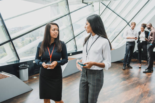 istock Businesswomen talking in the office 1020083838