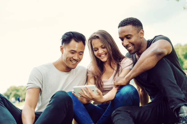 istock A group of multi-national people relaxing in nature 1020088570