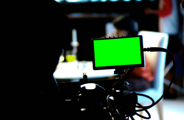 istock Movie camera with green screen motitor 1020088634