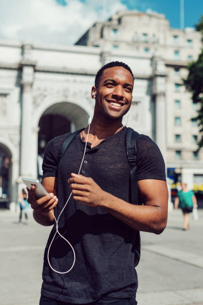istock Cheerful black guy in London downtown 1020089340