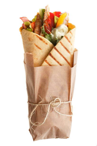 el doner kebab (shawarma) aislado en un fondo blanco. - wrapping paper fotografías e imágenes de stock