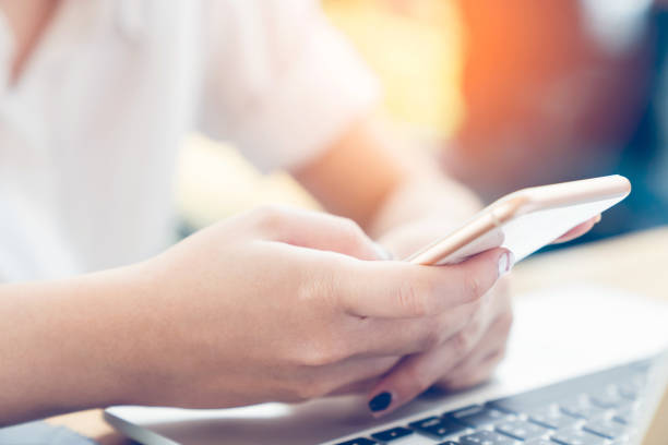 istock Closeup woman using mobile phone 1020101980