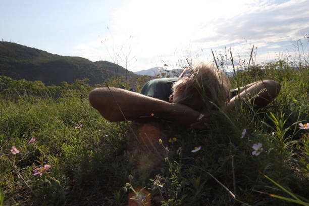 istock View past man to nature and hills behind 1020108152
