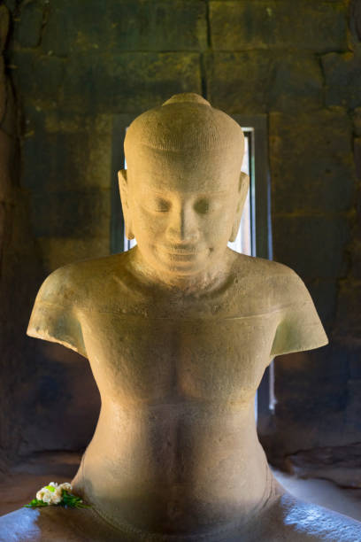 istock Jayavarman 7 stone statue inside Prasat Hin Phimai historical Park 1020108452