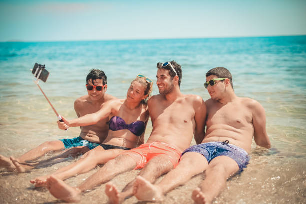 istock Friends on the beach 1020117972