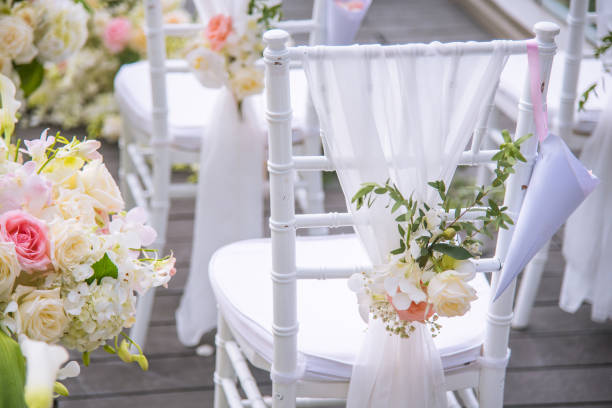 istock Chair decorated with flowers in Wedding ceremony. 1020118014