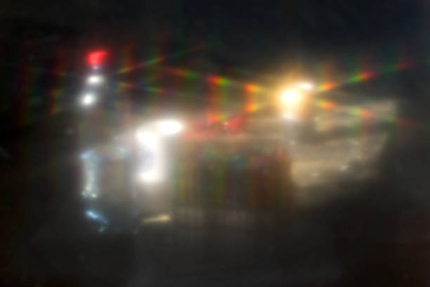 istock Abstract background rainbow color light streaks on black 1020118434