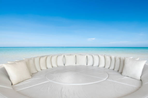 beach on a sunny day with sofas at lounge,Travel and vacation concept.