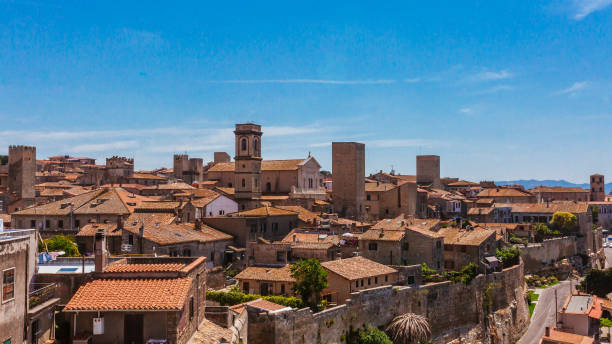 Old Houses and Church in the Town of Tarquinia, Italy stock photo