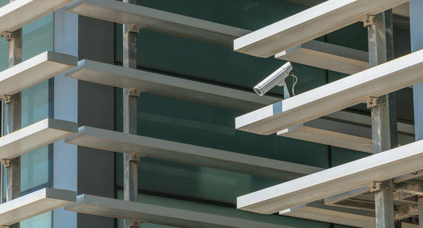 istock surveillance camera hidden in the facade of a modern building 1020134366