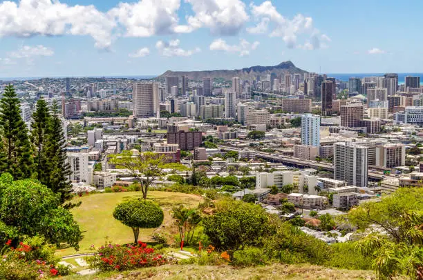 The National Memorial Cemetery of the Pacific from the Punchbowl Crater overlooks the City of Honolulu on the Island of Oahu in Hawaii.