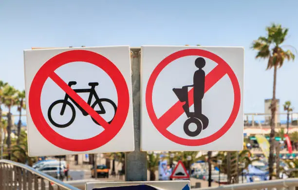 Photo of road signs prohibiting access to bicycles and Segway