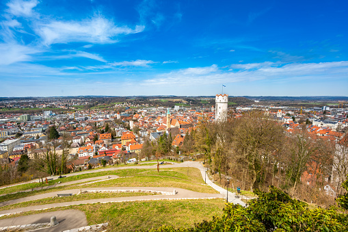 Ravensburg, Europe  - April 3, 2018: Ravensburg  view showing mountain, houses, grass, trees, streets, and tower