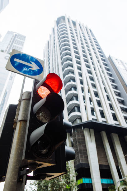 istock Traffic light on street with red signal lit up 1020151868
