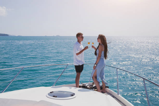 istock couple drinking champange on luxury yacht 1020158300