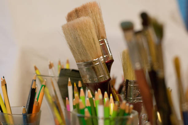 istock Group of old used paint brushes with clean background, 1020158306