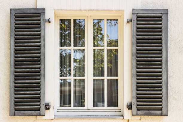 istock Wooden window with shutters 1020163756