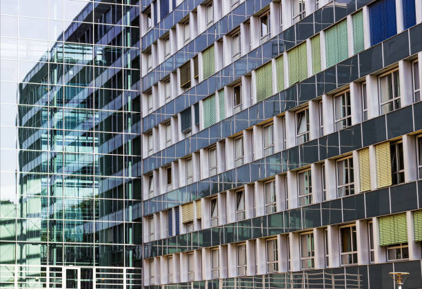 istock Facade of a modern apartment building. Blue sky. 1020166356