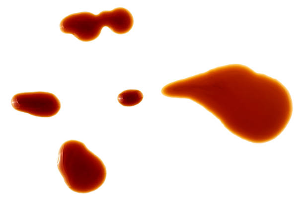 istock Spilled soy sauce isolated on white background 1020169436