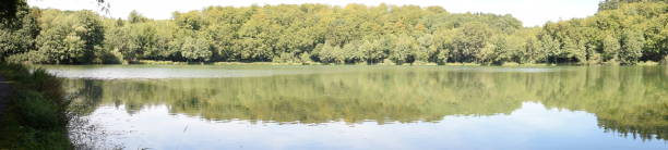 istock caldera lake 'Holzmaar' in Eifel region 1020170364