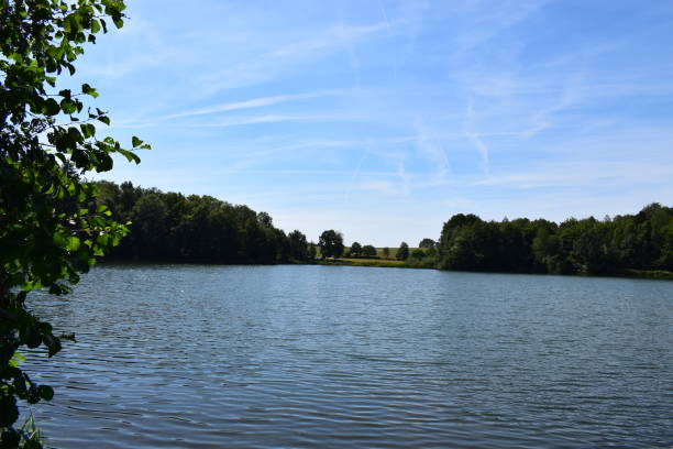 istock caldera lake 'Holzmaar' in Eifel region 1020178484