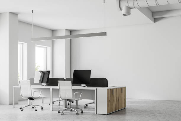 istock Corner of an open space office, mock up wall 1020184048