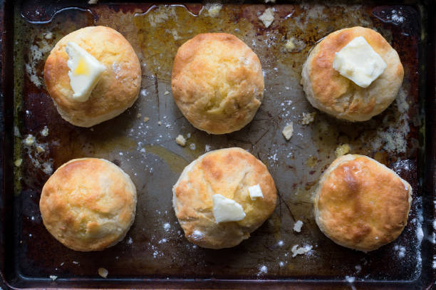 Homemade country biscuits with butter flat lay stock photo