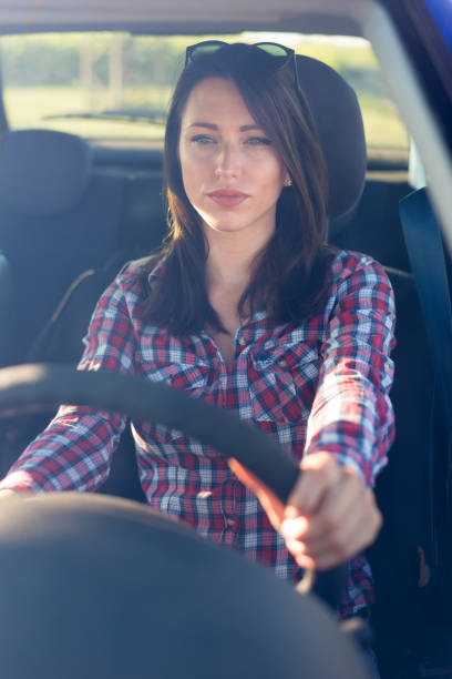 istock Woman driving car 1020192156