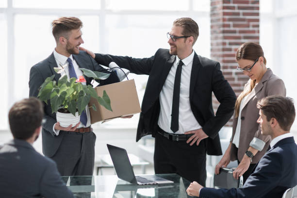 istock employee with personal belongings leaving the office 1020211008