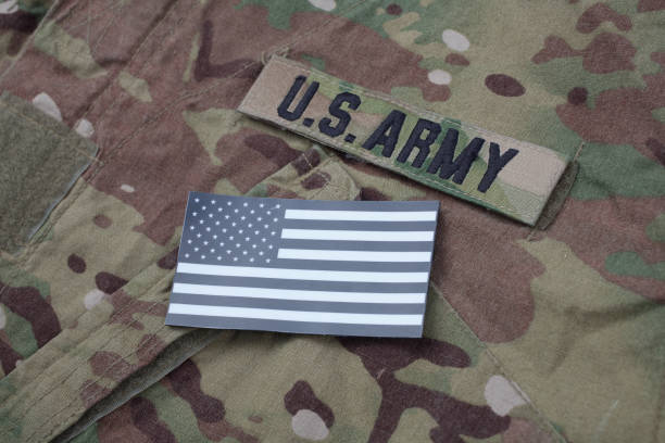 istock US flag patch with dog tag on multicam camouflage uniform 1020211586