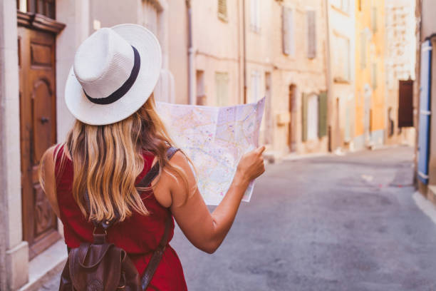 travel to Europe, tourist looking at map on the street, summer holidays travel to Europe, tourist looking at map on the street, summer holidays sightseeing tourism catalonia photos stock pictures, royalty-free photos & images