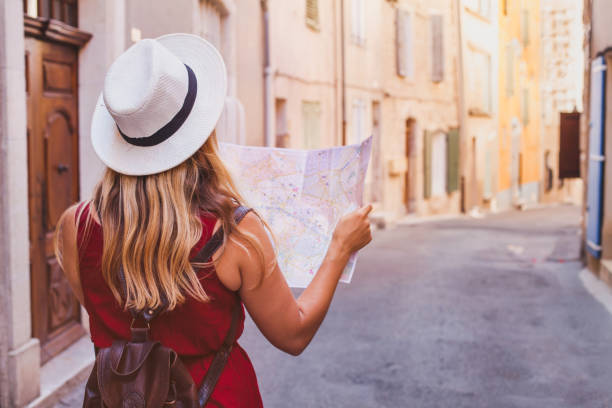 travel to Europe, tourist looking at map on the street, summer holidays travel to Europe, tourist looking at map on the street, summer holidays sightseeing tourism barcelona province stock pictures, royalty-free photos & images