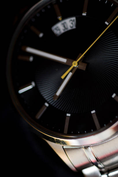istock Men's silver watch on black background 1020227028