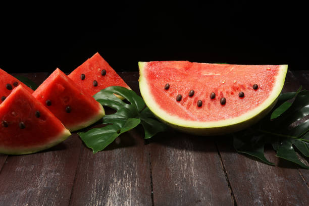 istock watermelon on table. juicy summer fruit in slices. 1020227102