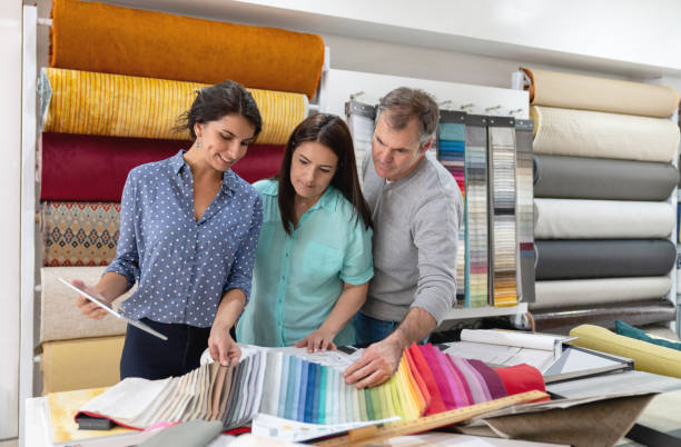 istock Happy couple choosing fabrics for a house project 1020230270