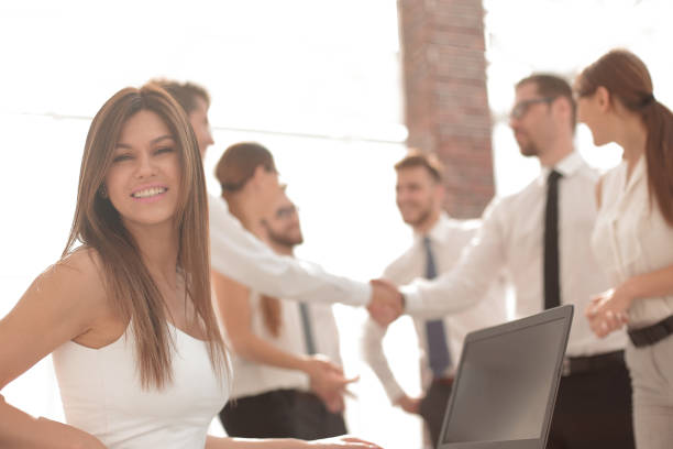 istock smiling business woman in modern office 1020233848